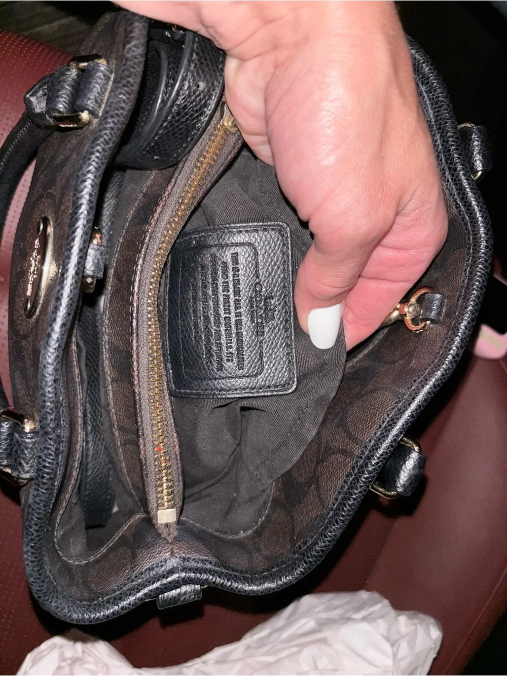 Coach satchel signature