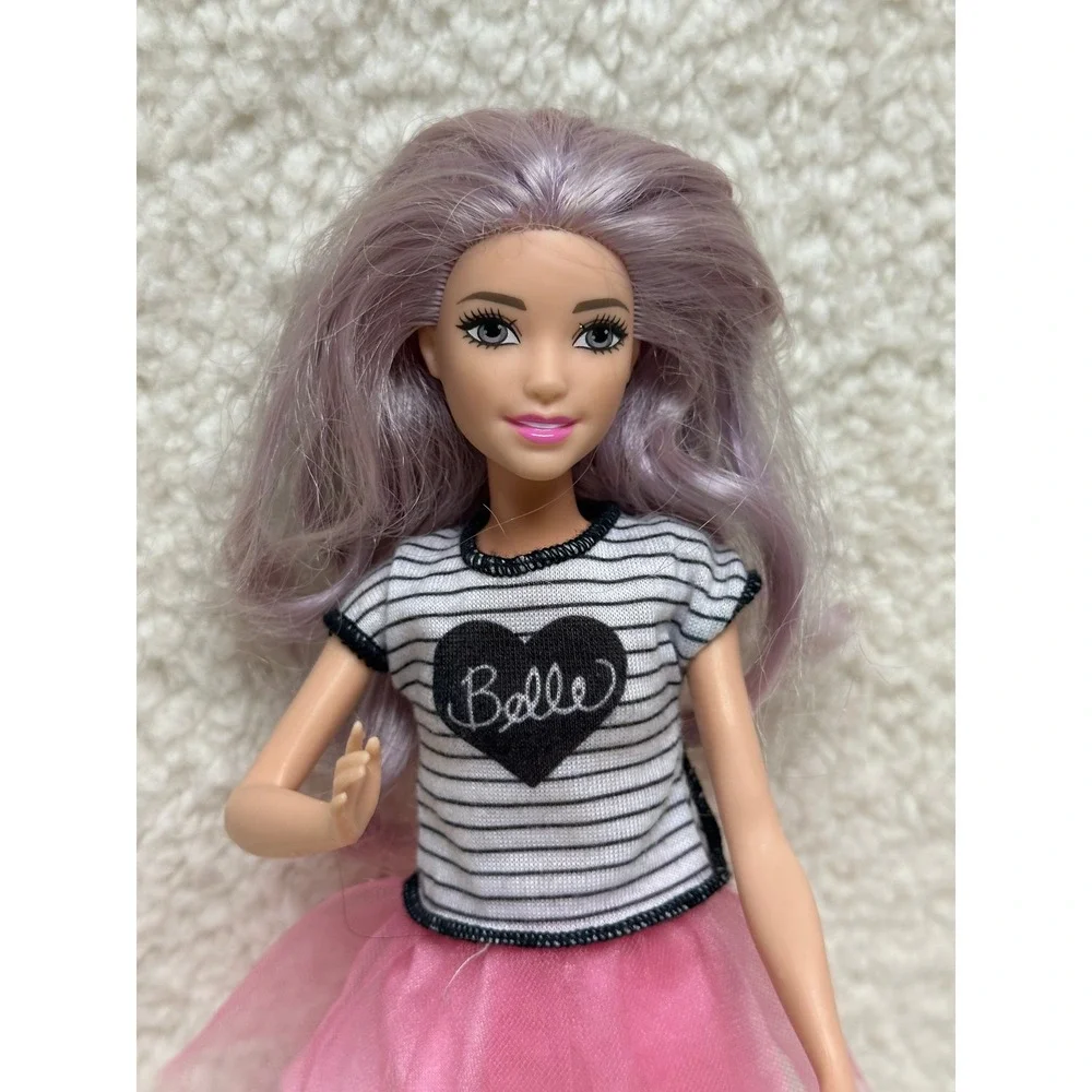 Barbie doll features