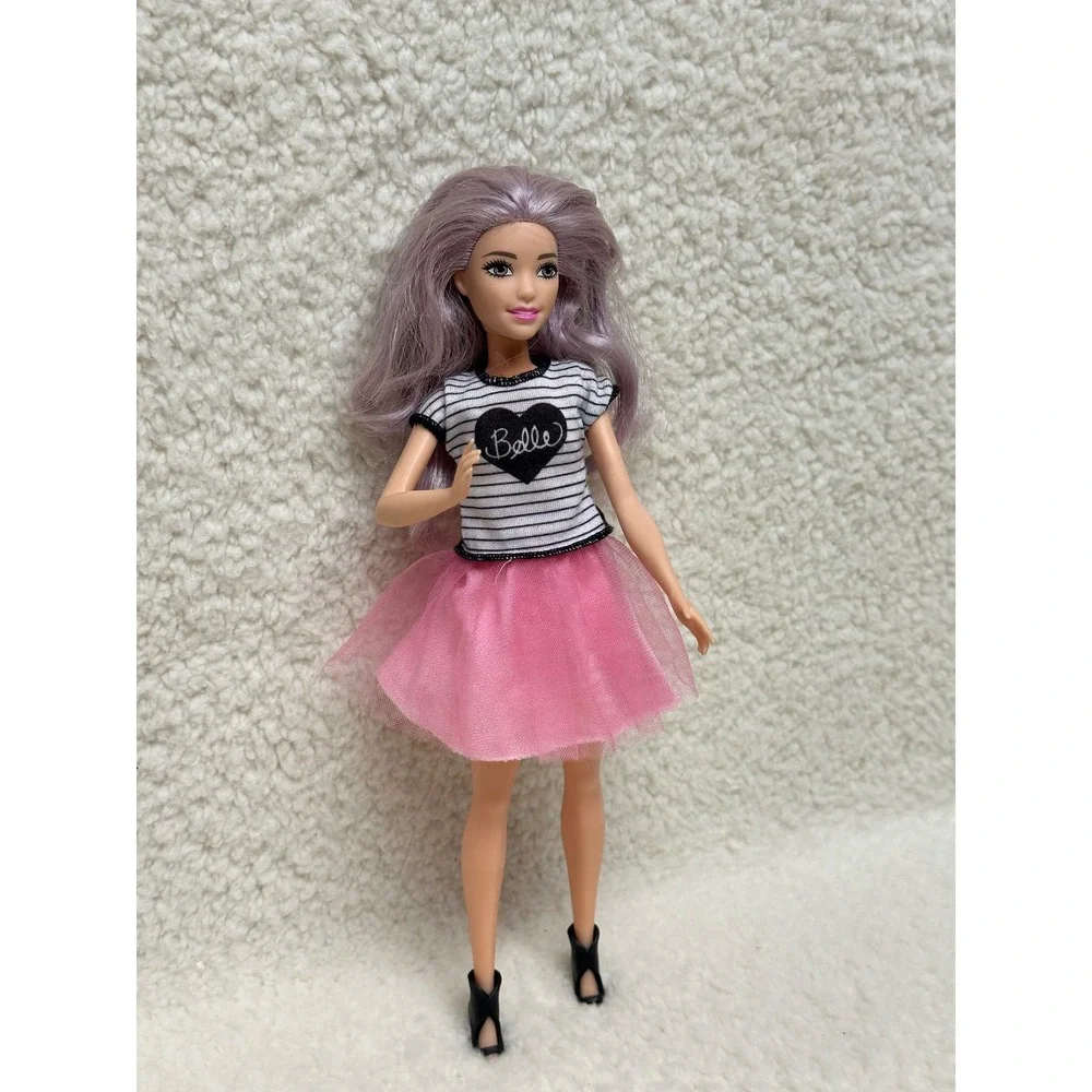 Barbie doll features