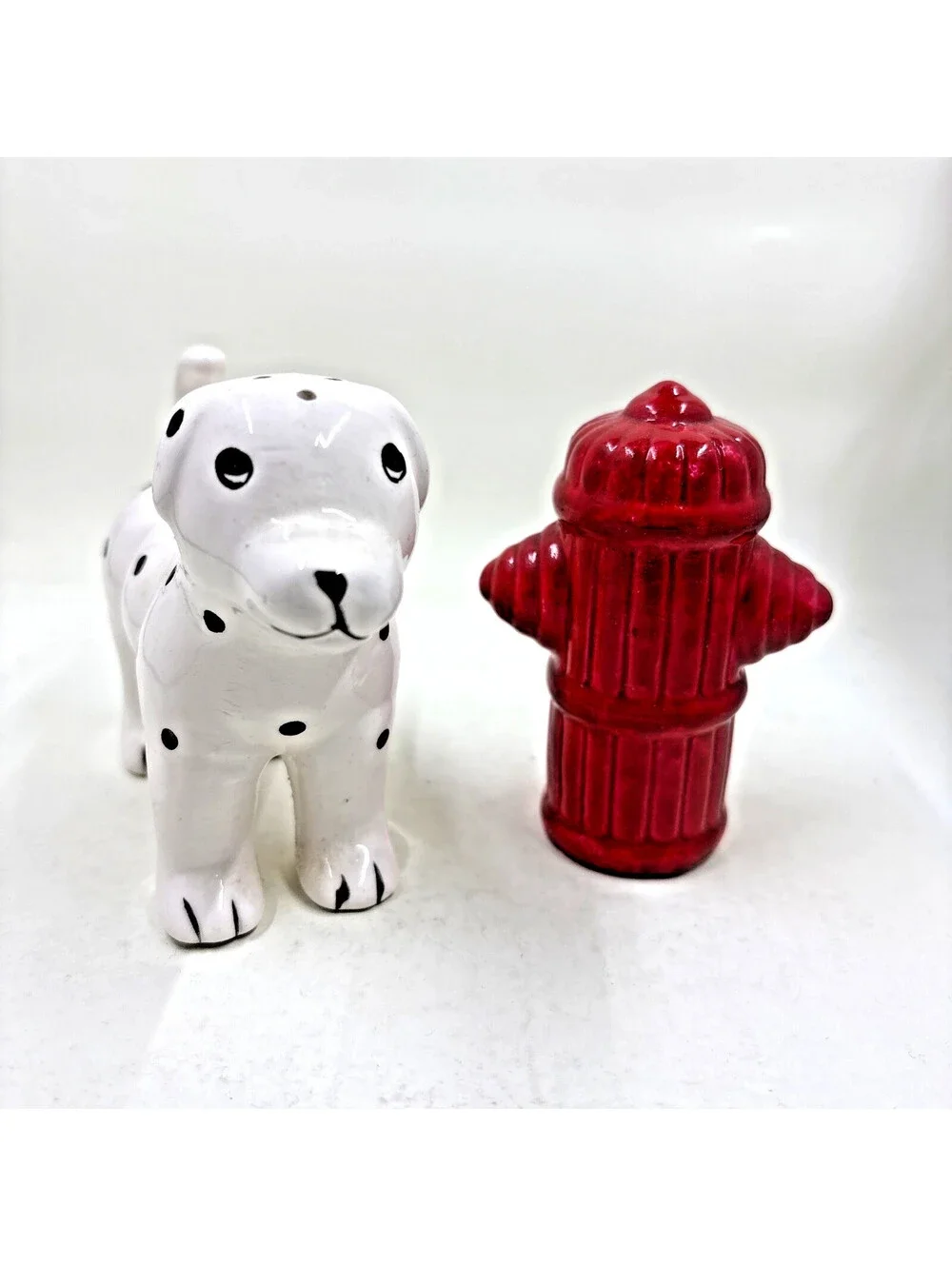 Ceramic Dalmatian dog and fire hydrant ceramic salt & pepper shaker set