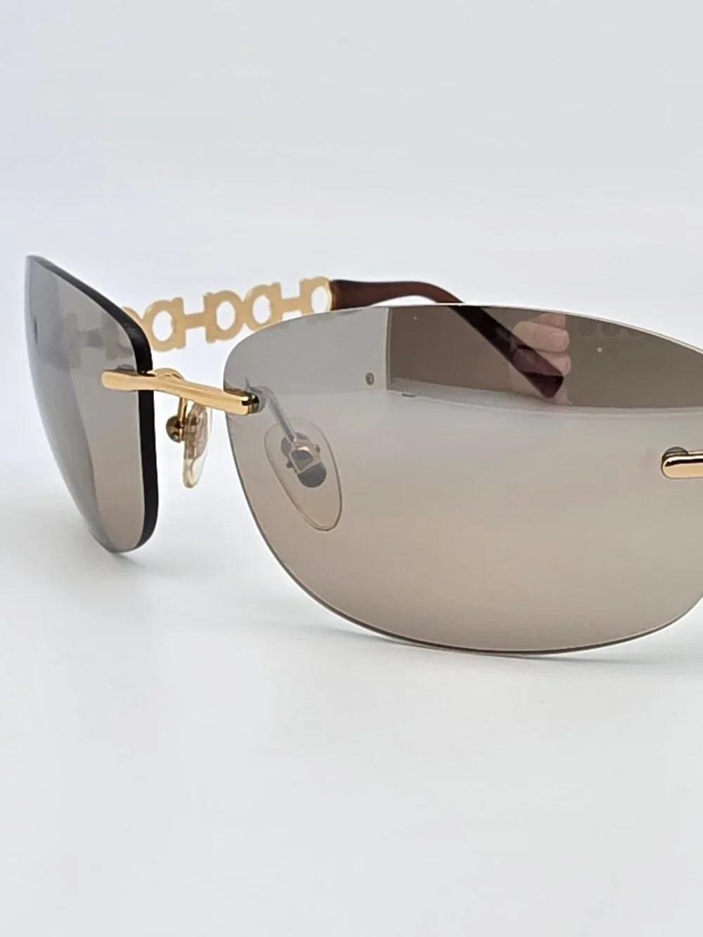 Salvatore Ferragamo 1055 Gold Gancini Frame Gold Mirror Rimless Sunglasses 61mm