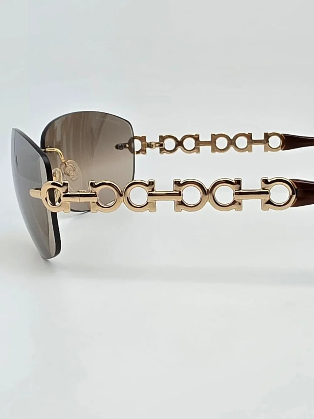 Salvatore Ferragamo 1055 Gold Gancini Frame Gold Mirror Rimless Sunglasses 61mm