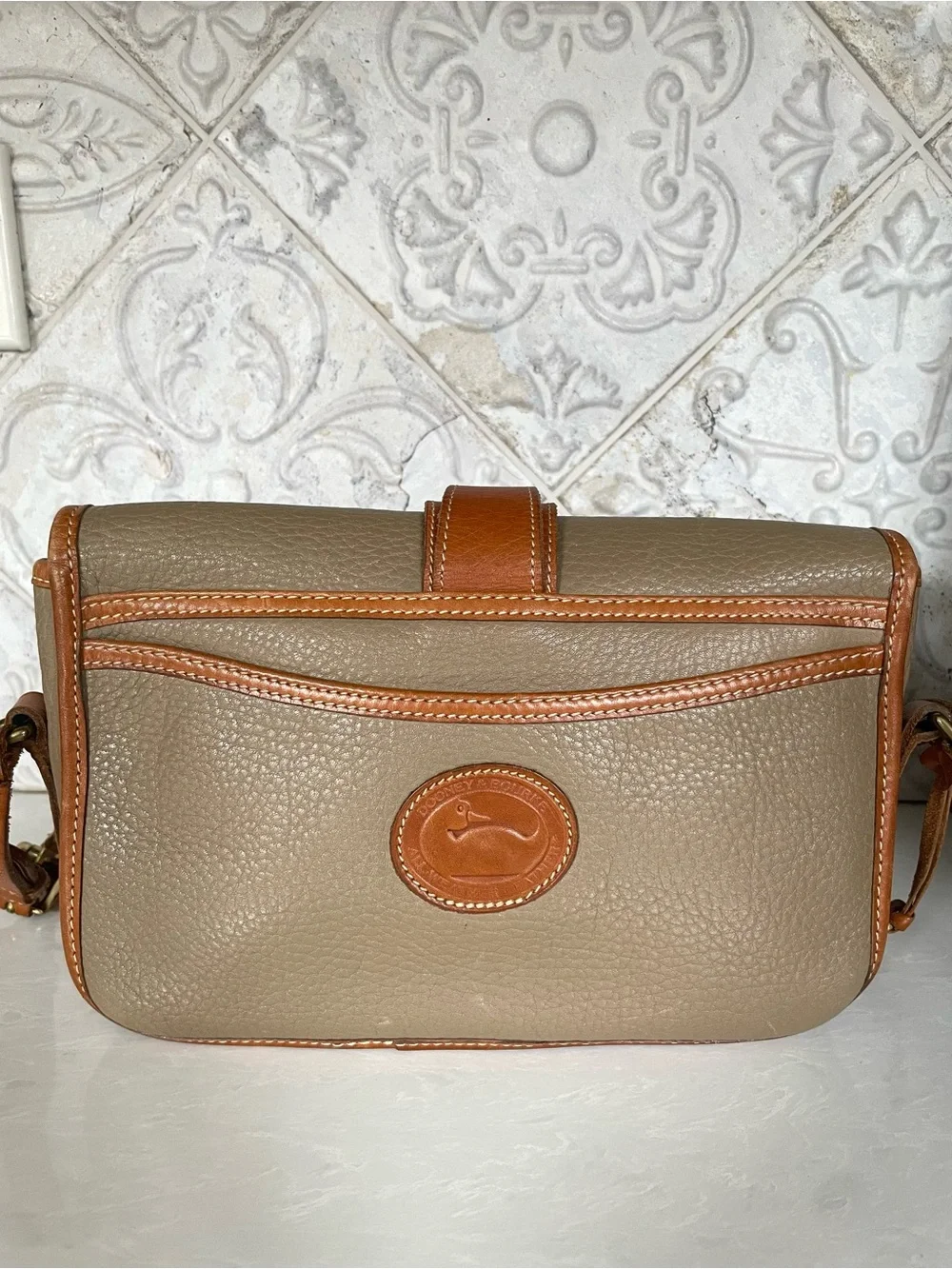 Dooney & Bourke pebbled taupe