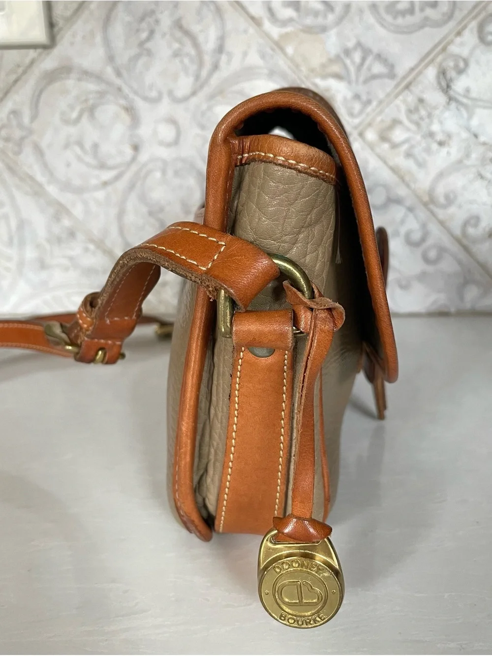 Dooney & Bourke pebbled taupe