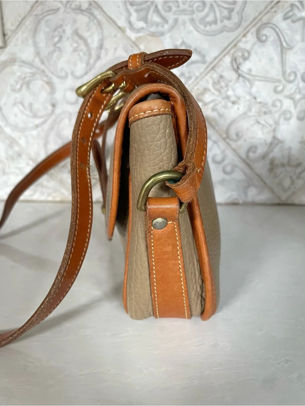 Dooney & Bourke pebbled taupe