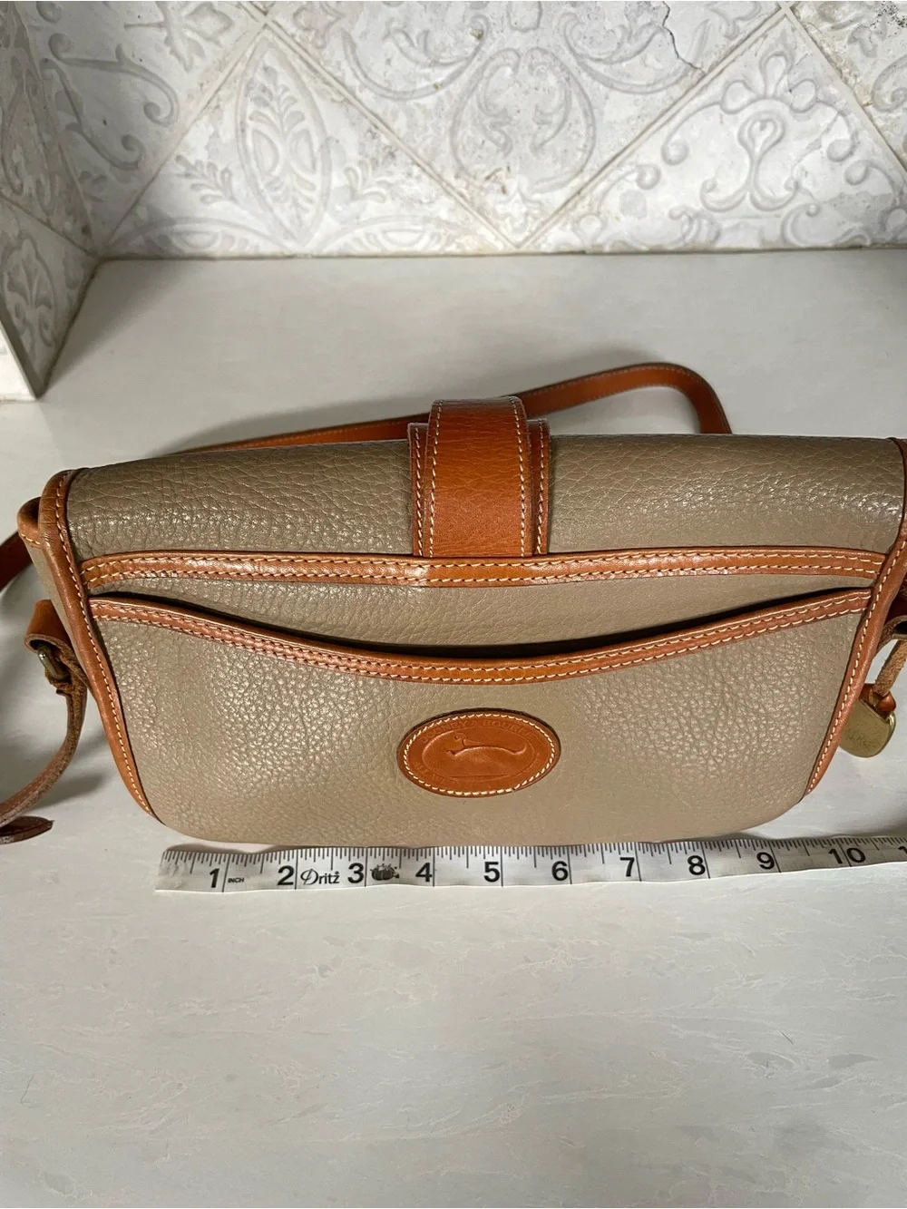 Dooney & Bourke pebbled taupe