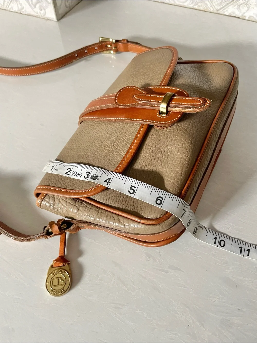 Dooney & Bourke pebbled taupe