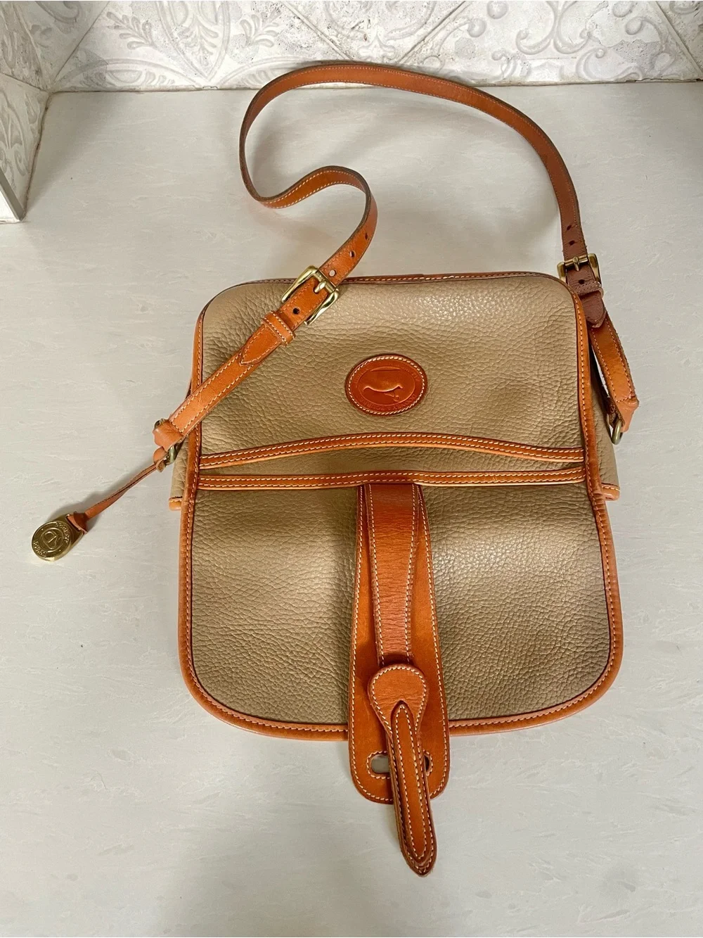 Dooney & Bourke pebbled taupe