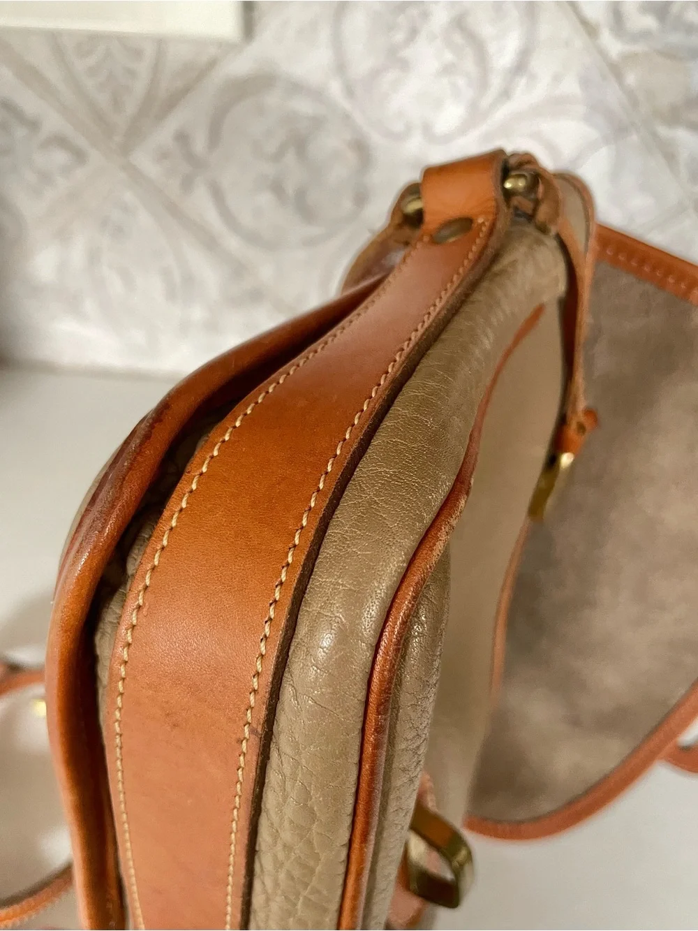 Dooney & Bourke pebbled taupe