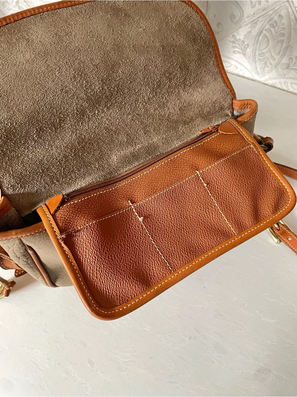 Dooney & Bourke pebbled taupe
