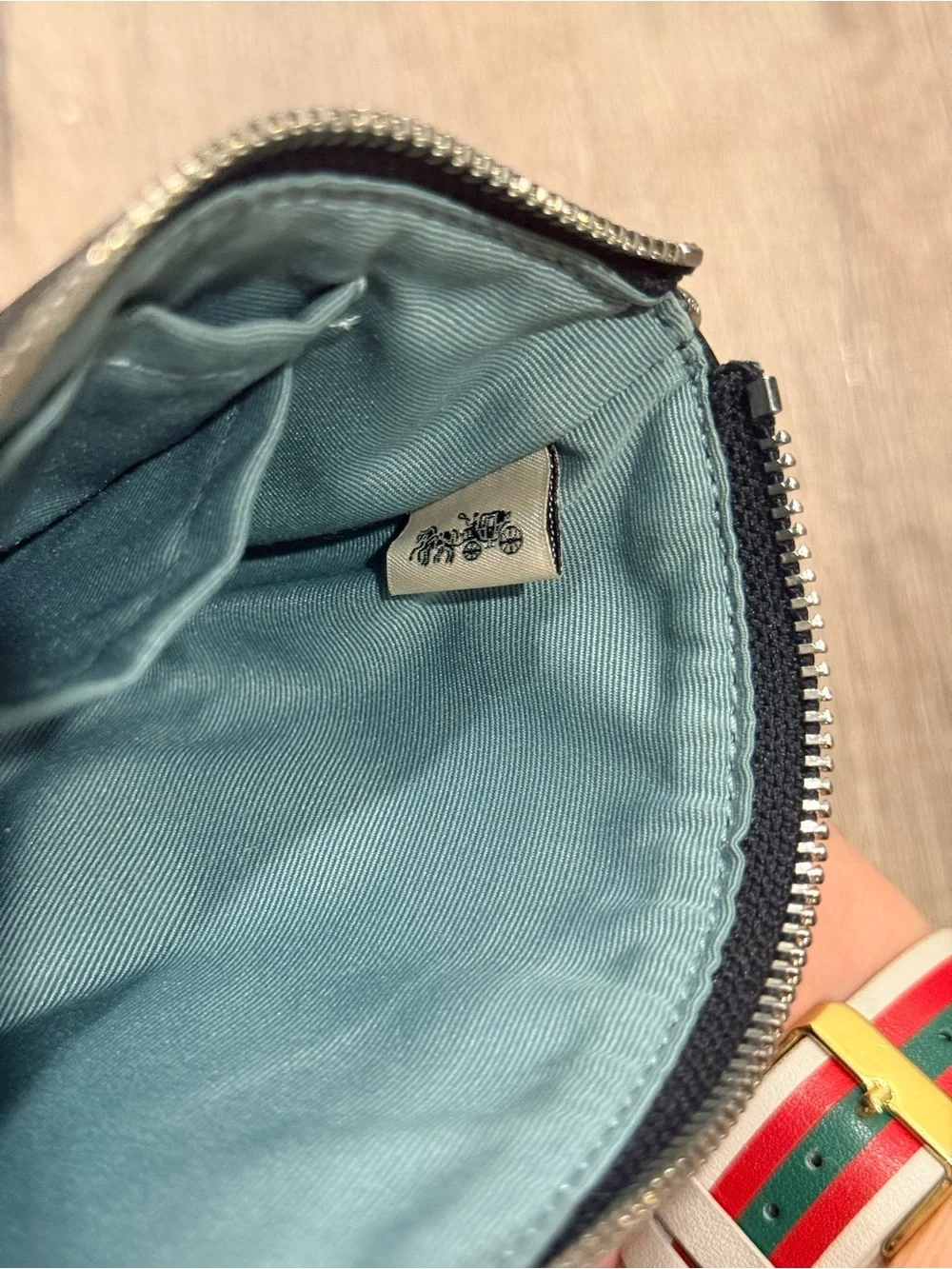 Coach corner zip