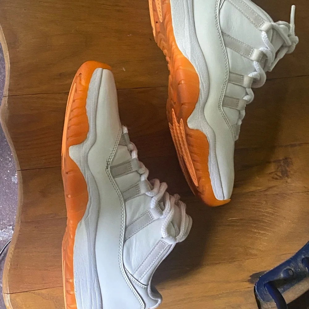 Jordan Women’s White and Orange Sneakers