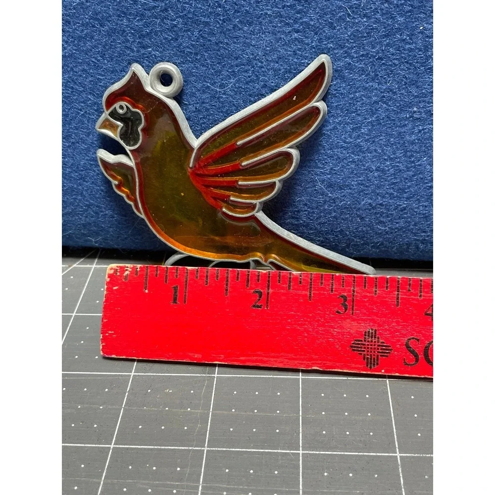 The Unbranded Brand suncatcher cardinal