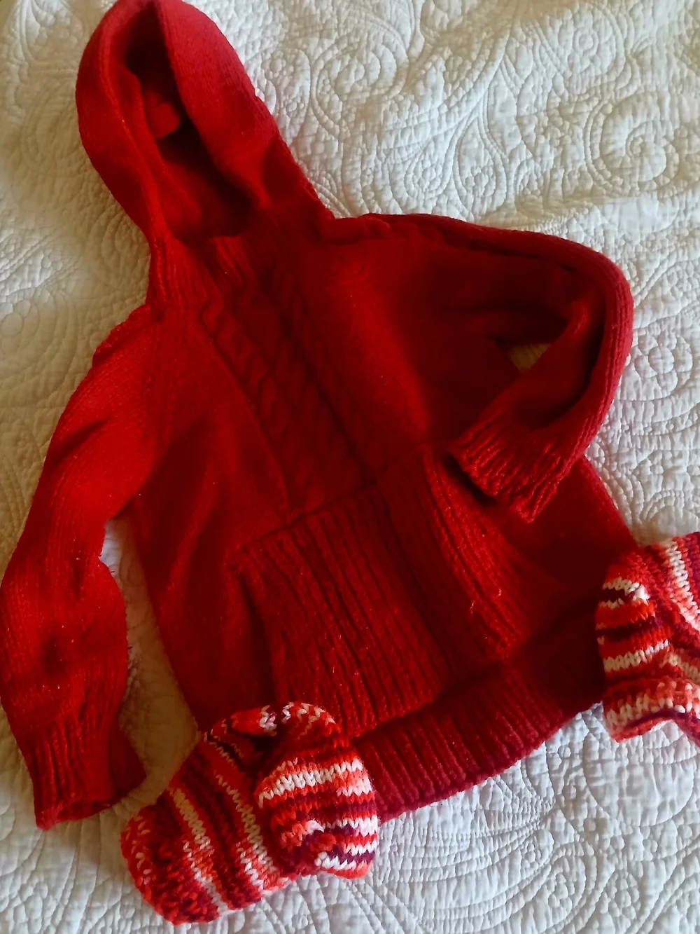 Various handknit toddler winter wear