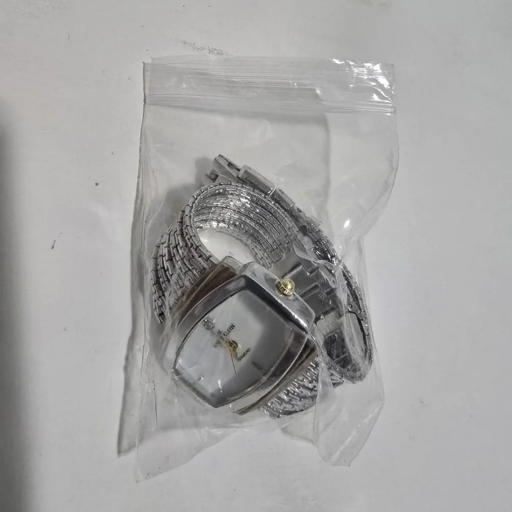 Anne Klein metal preowned or