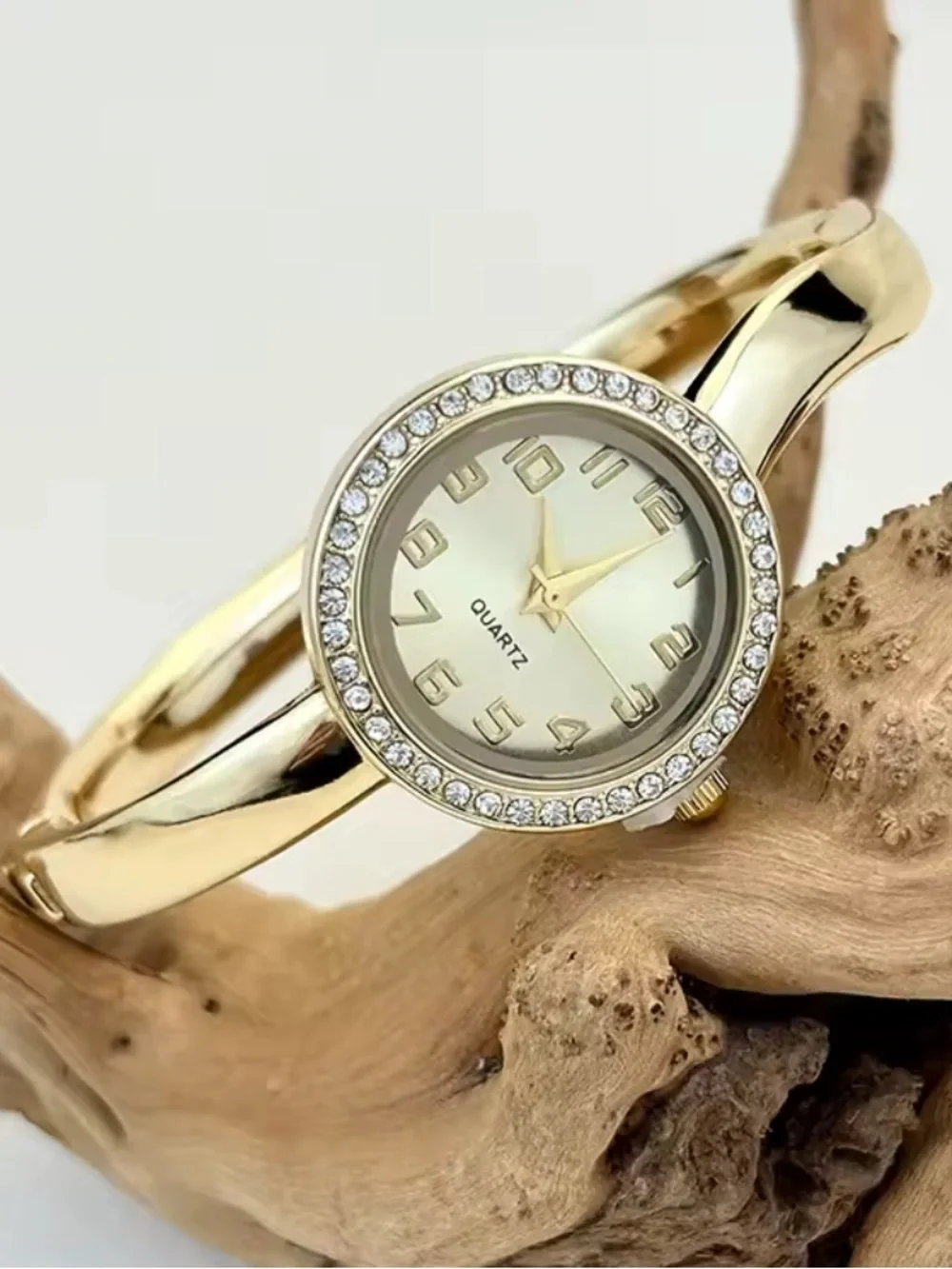 Anthropologie shiny gold
