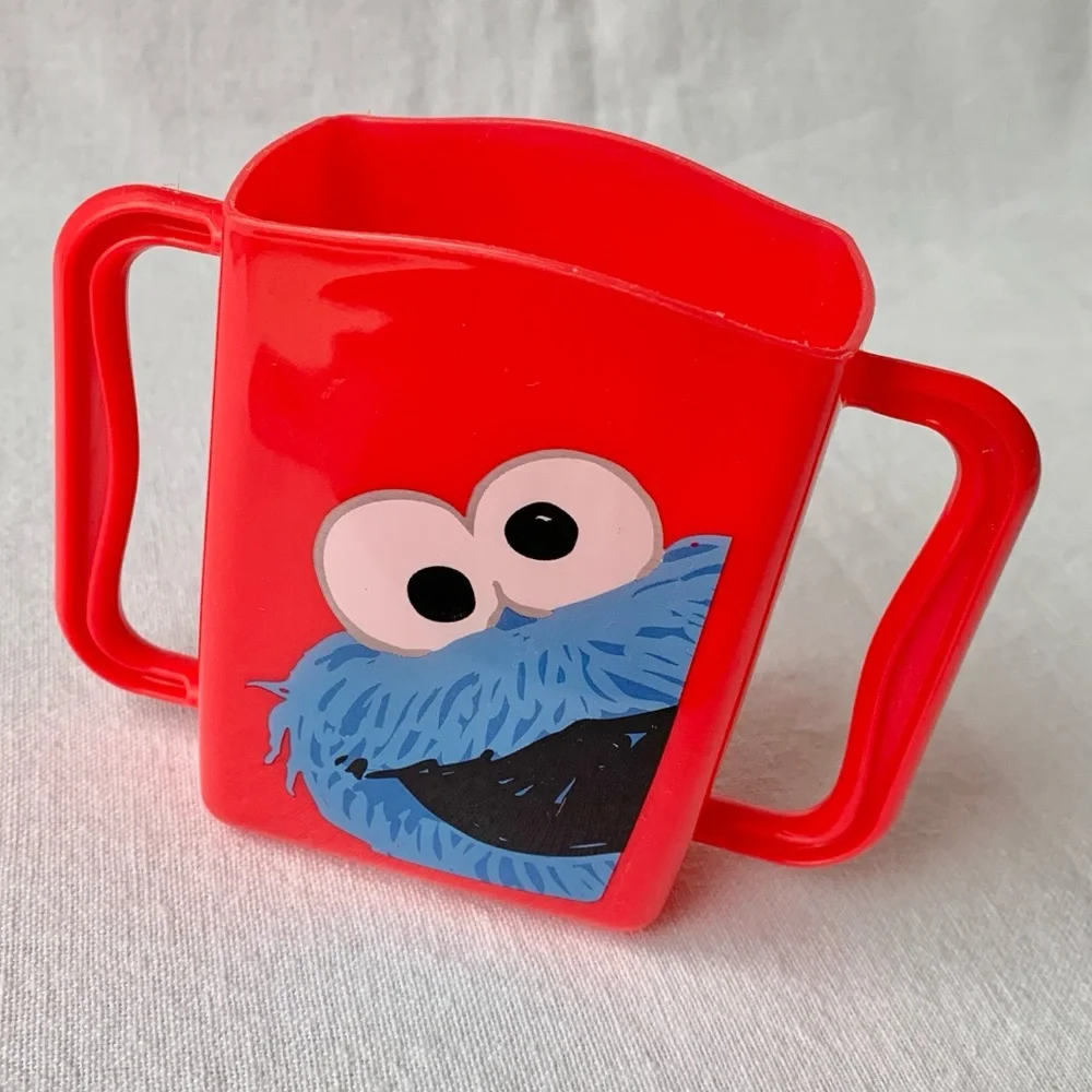 2013 Sesame Street Cookie Monster Kids Red Plastic Juice Box Holder with Handles