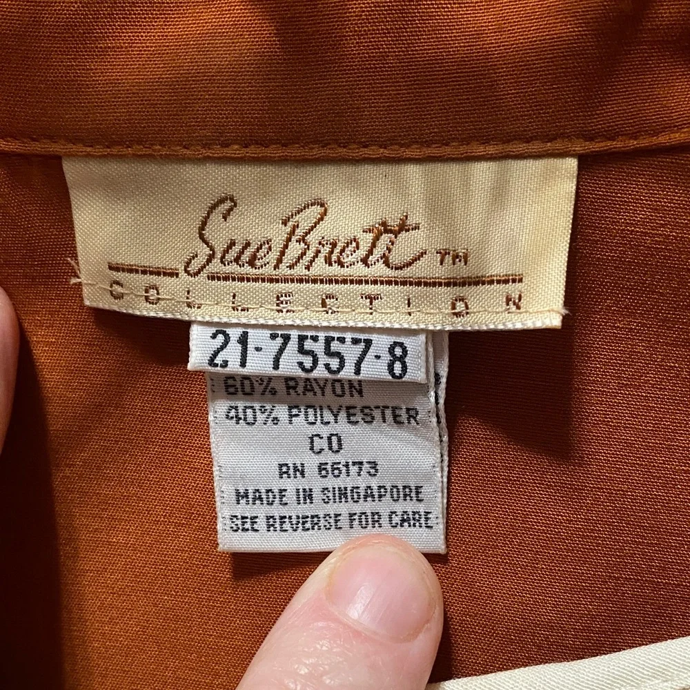 Sue Brett stylish orange