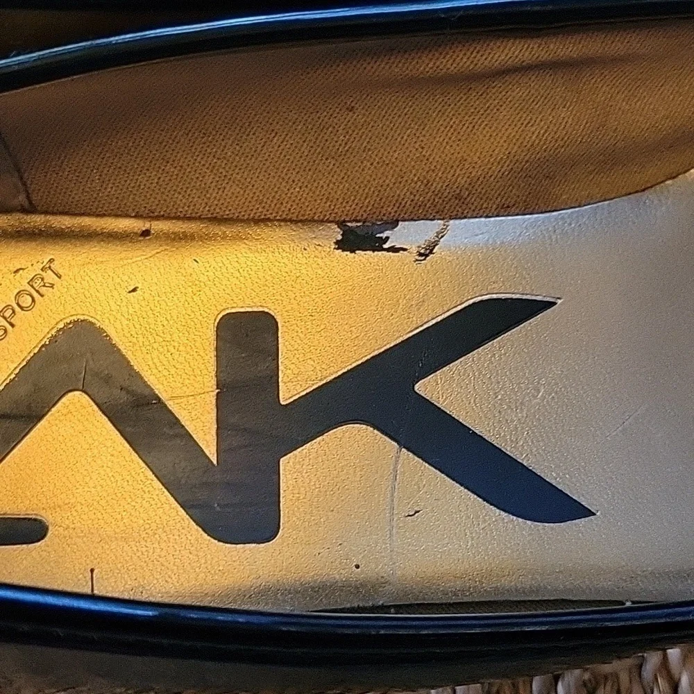 ANNE KLEIN SPORT round toe ballet shoes.  Slight wedge.  Size is 9.