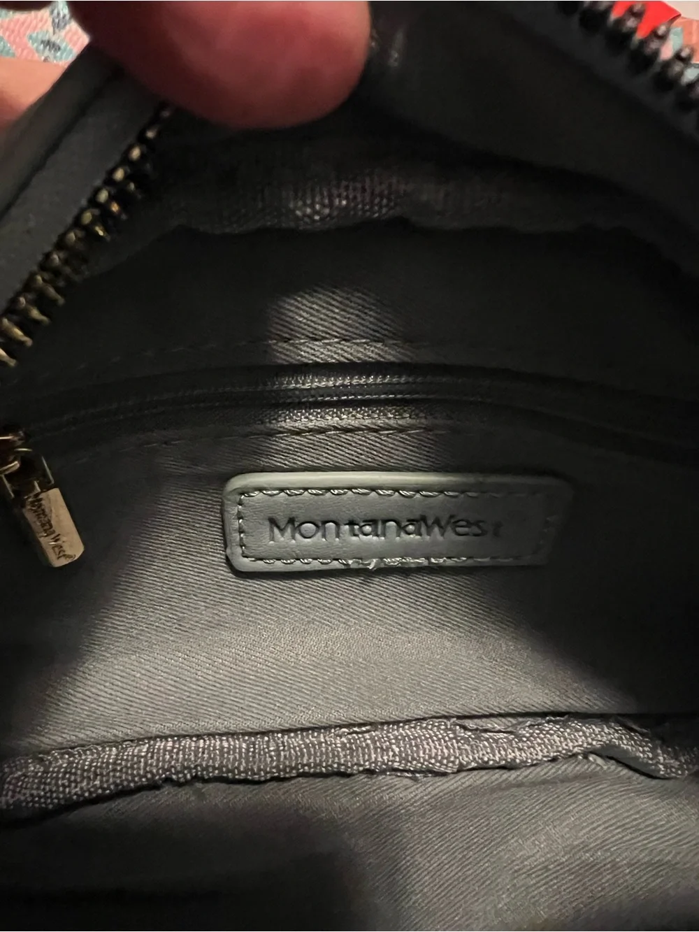 Montana West zip logo