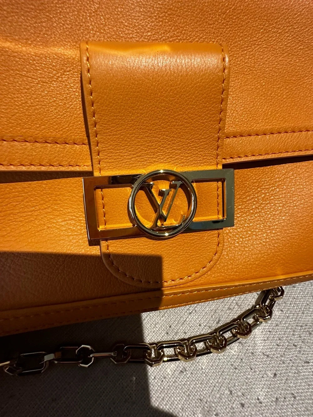 Louis Vuitton orange leather wear