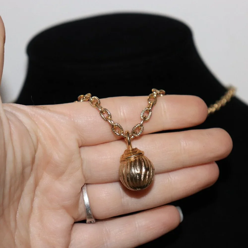 Beautiful gold necklace with ball pendant 19