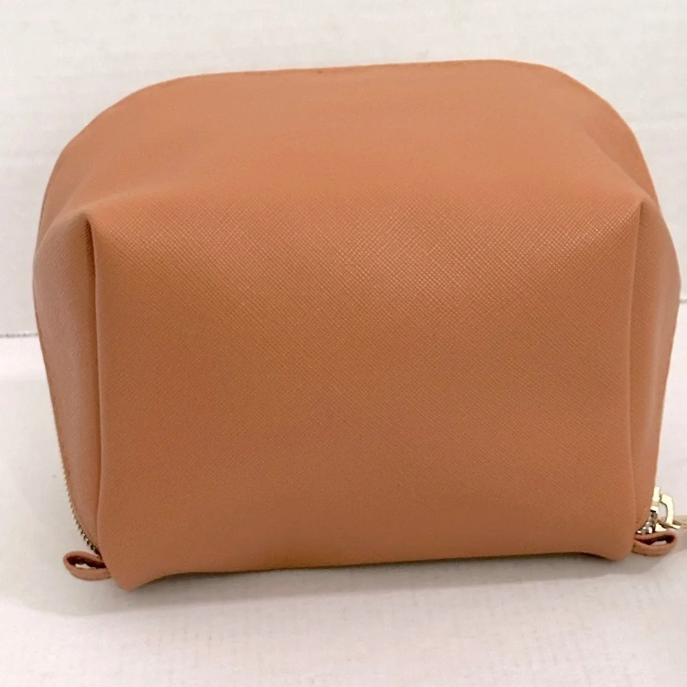 Moroccan oil Tan travel Bag from recycled materials NWOT