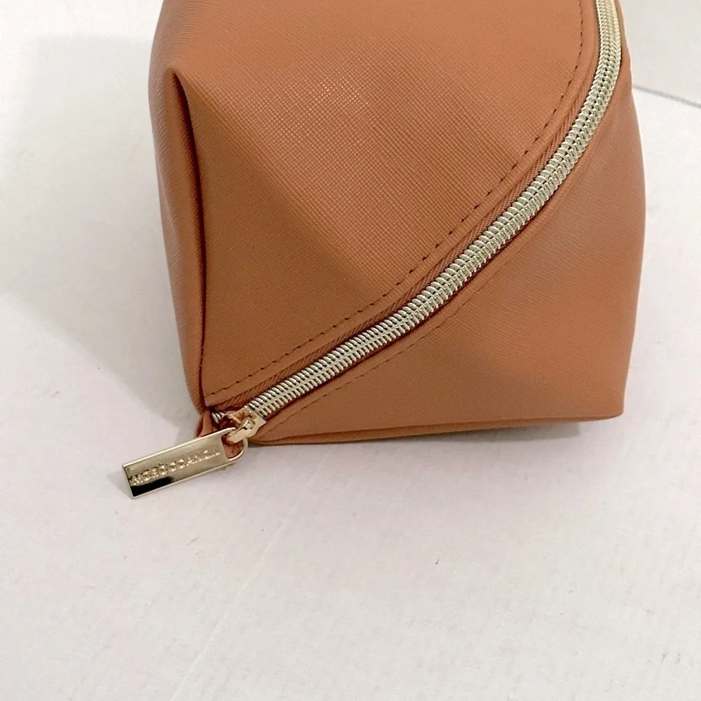 Moroccan oil Tan travel Bag from recycled materials NWOT