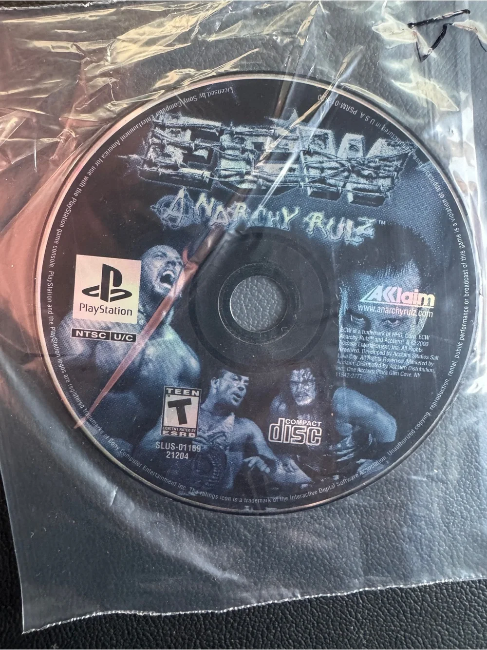 PlayStation 1 video game disc 'ECW Anarchy Rulz' by Acclaim Entertainment