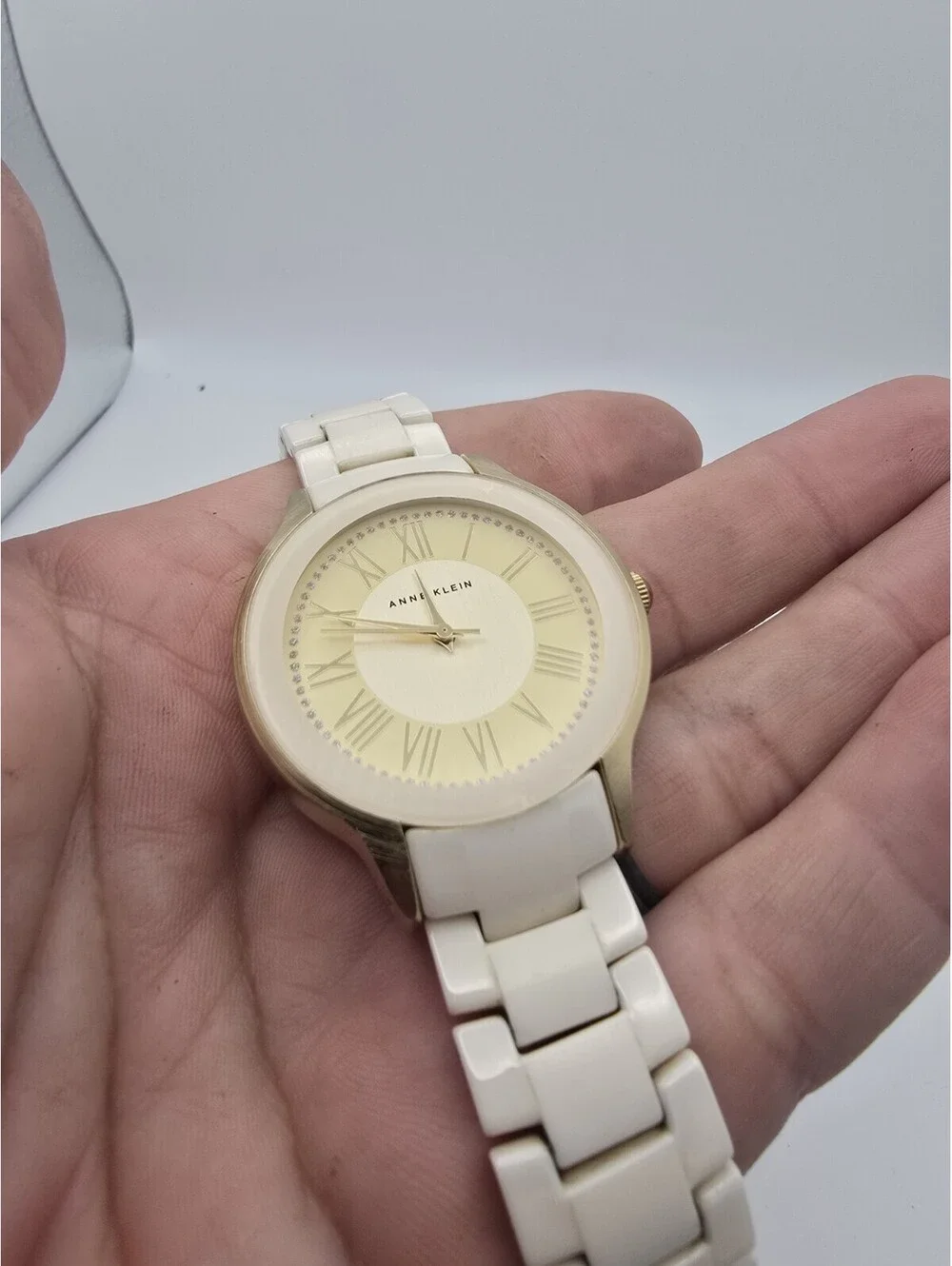 Anne Klein AK/1948 Women’s Quartz Analog Watch Gold Tone Case White Ceramic