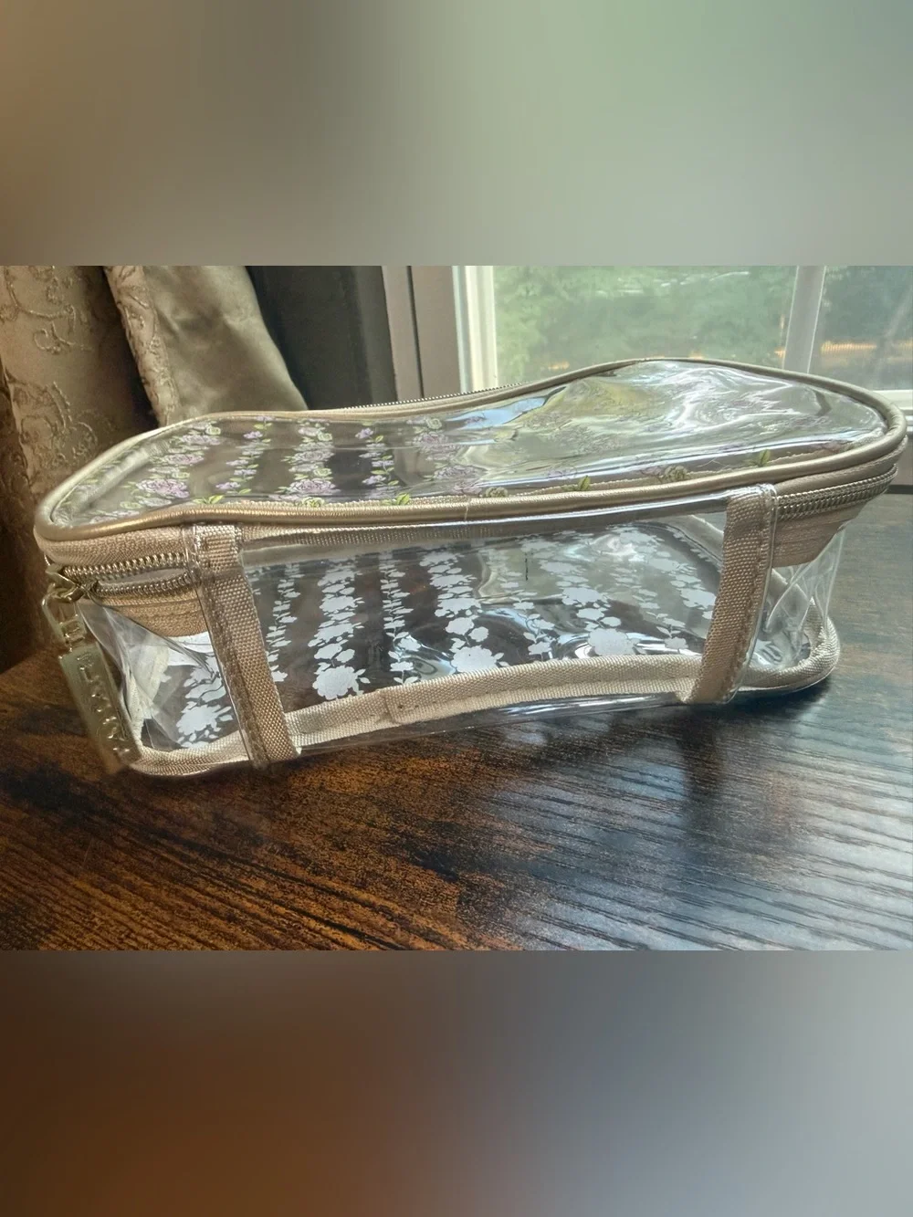 Tahari Clear Cosmetic Bag with Beige Trim and Purple Floral Pattern