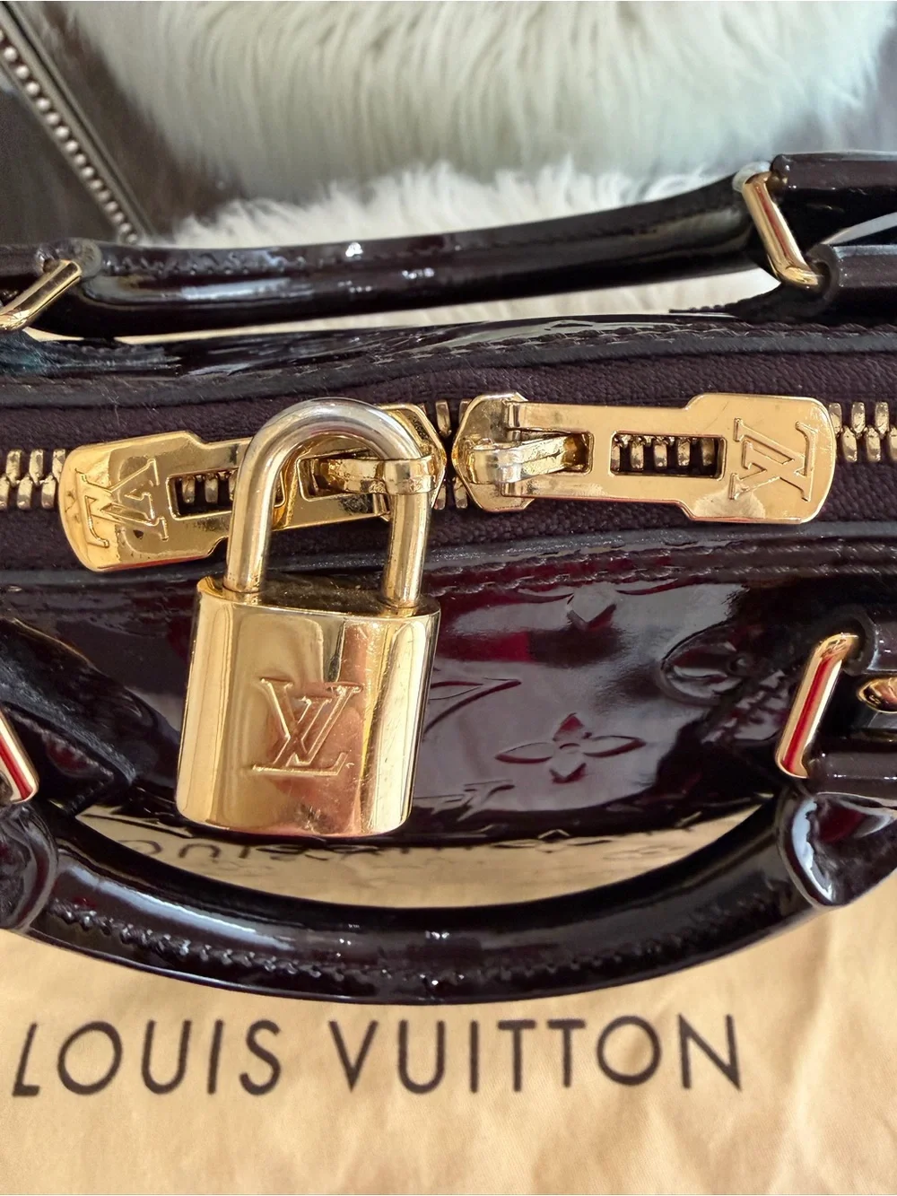Louis Vuitton dust scratches