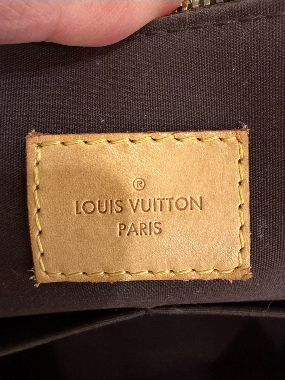 Louis Vuitton embossed elegant detailing