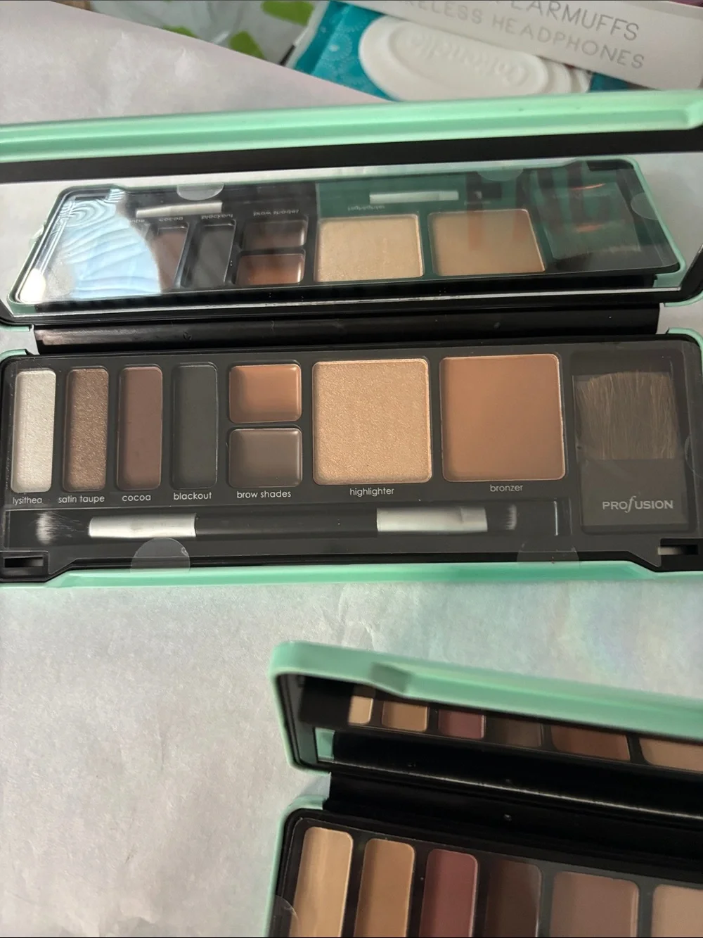 Profusion Eyeshadow Palettes. Natural and Night with Holographic Accents