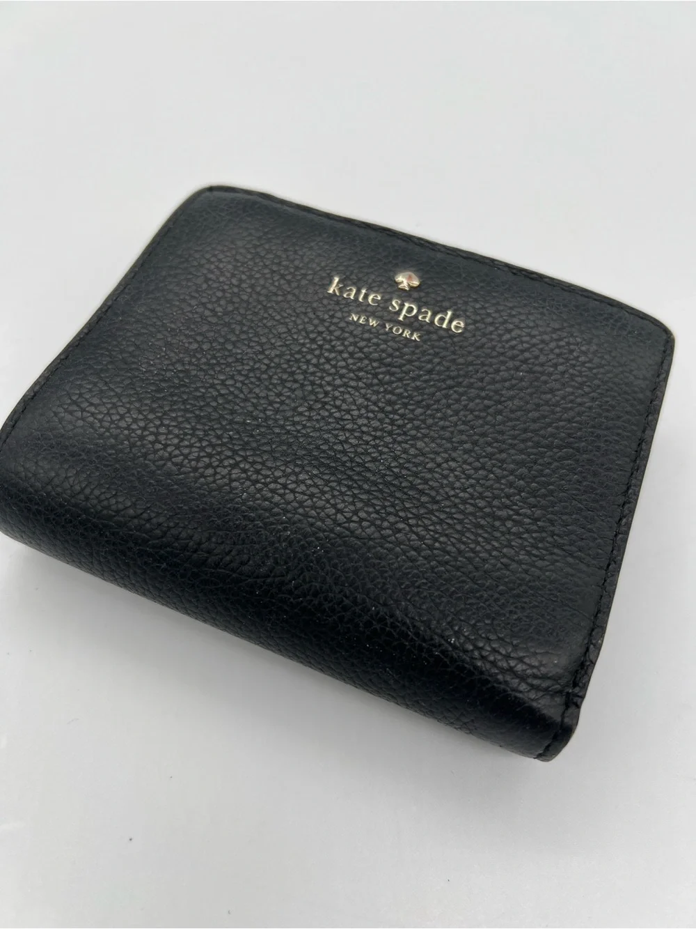 kate spade Black Pebbled Leather Zip Wallet with Gold Logo