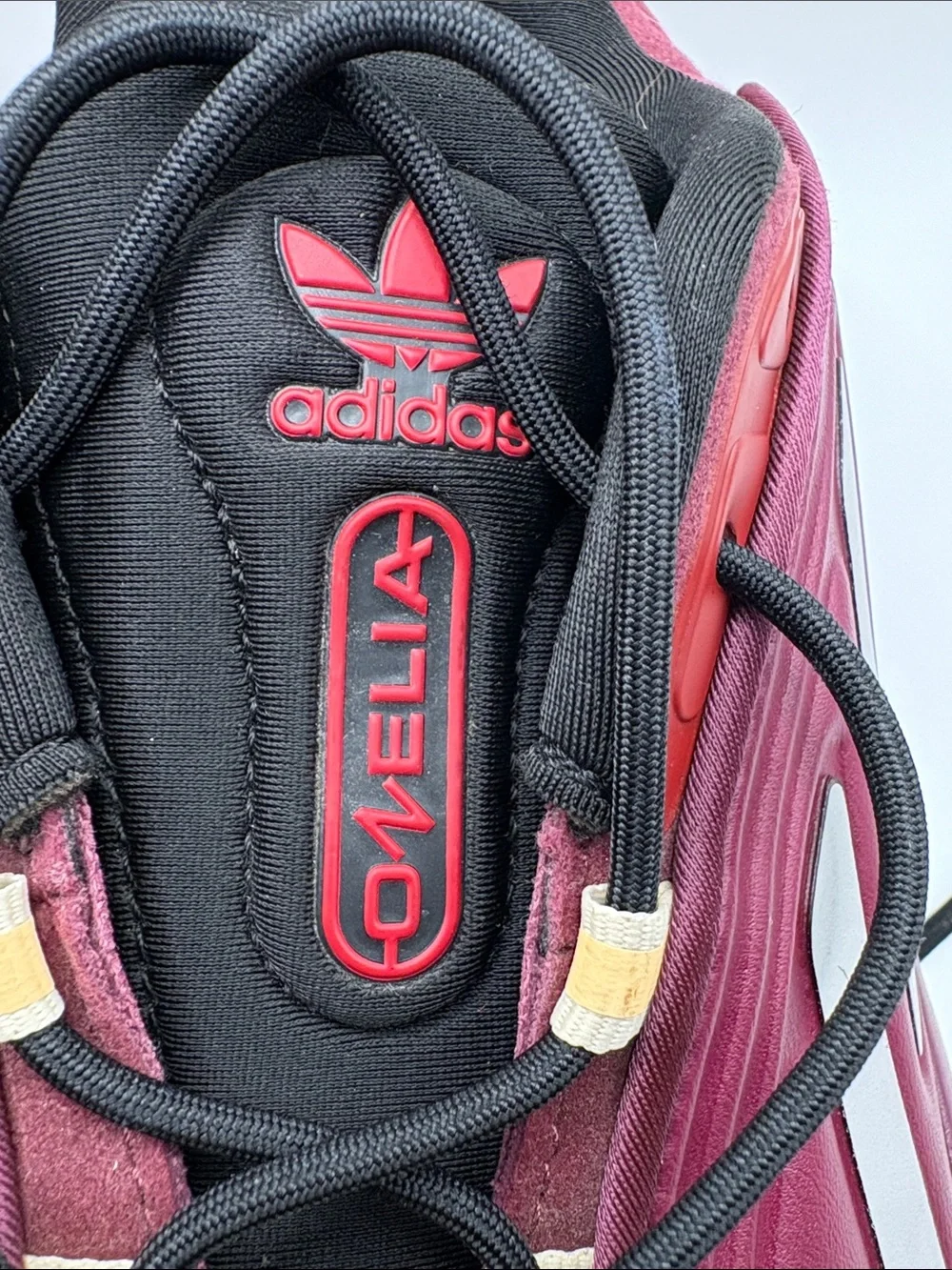 adidas OZELIA Men’s Burgundy and Black Running Sneaker with Yellow Accents