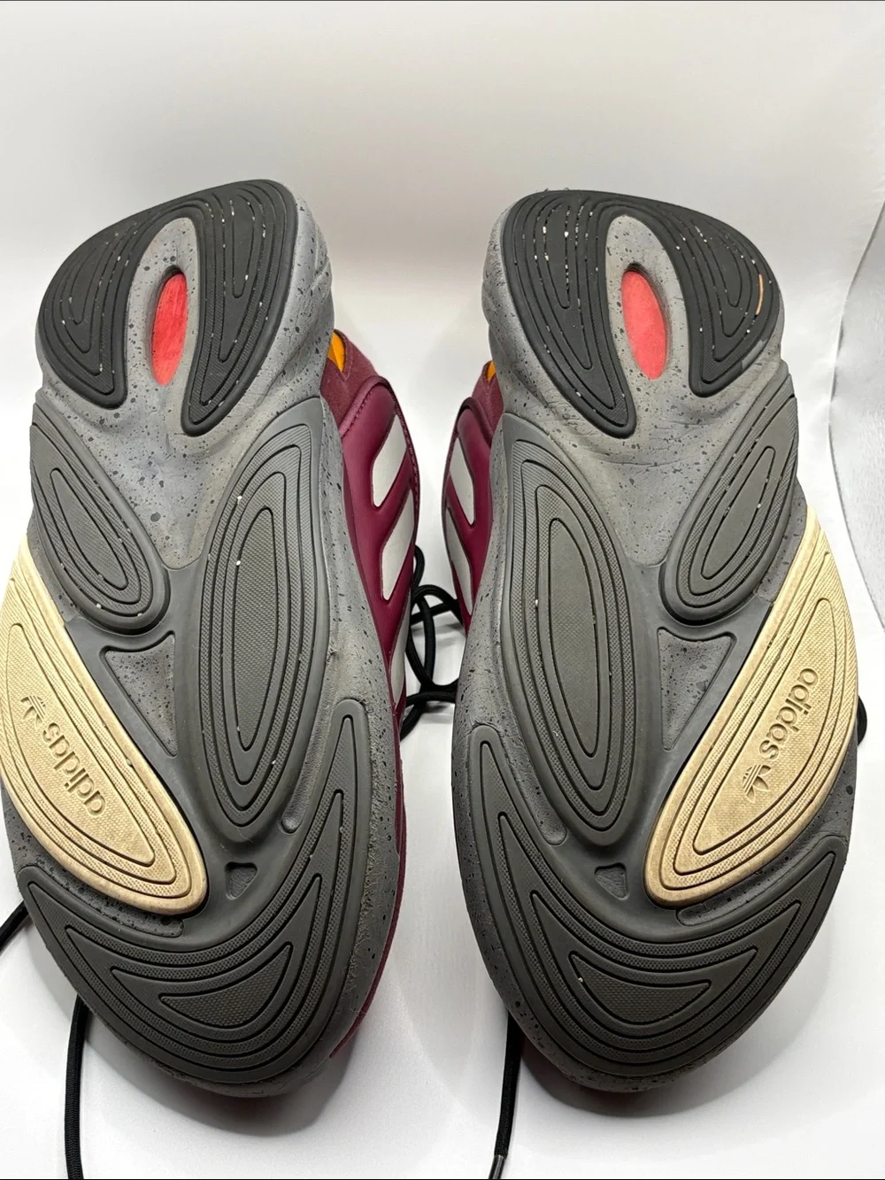 adidas OZELIA Men’s Burgundy and Black Running Sneaker with Yellow Accents