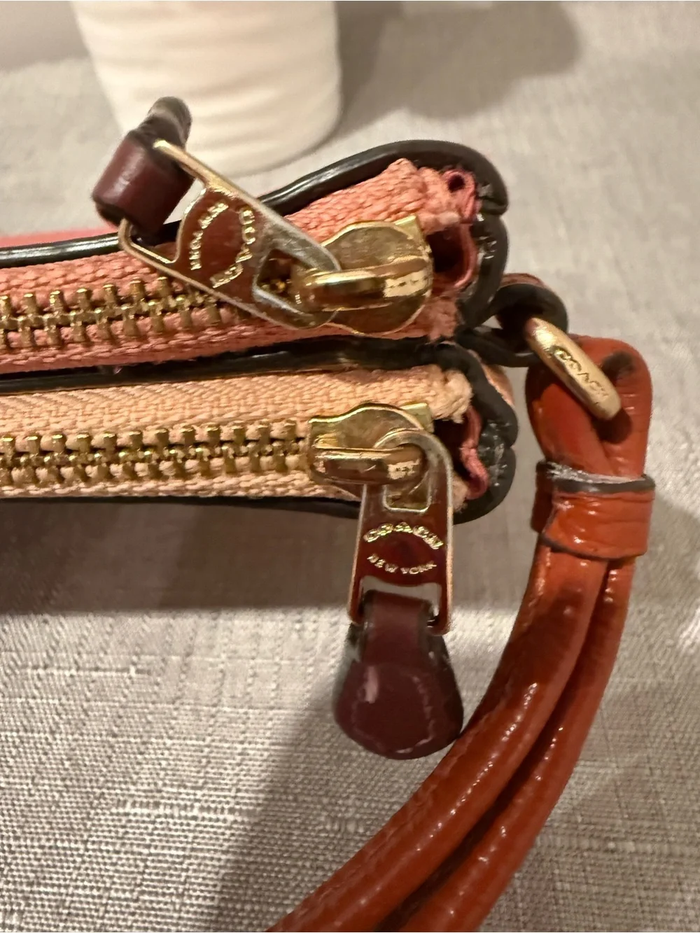 Coach compact pebbled