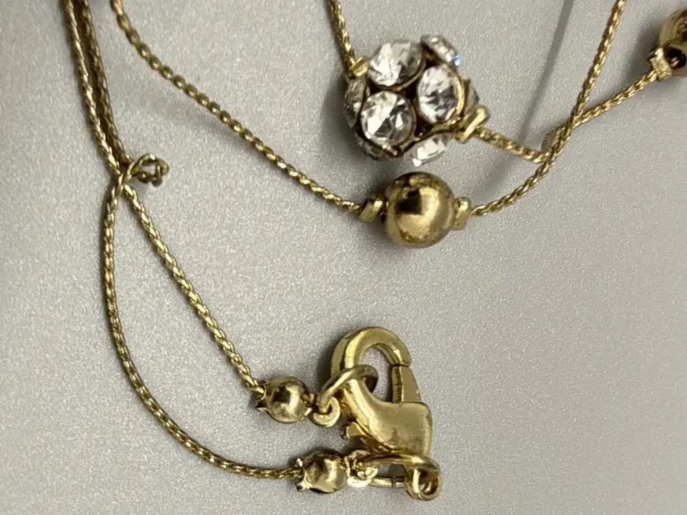 Gold Tone Long Station Necklace Coiled Spring Beehive and Rhinestone Beads Vtg