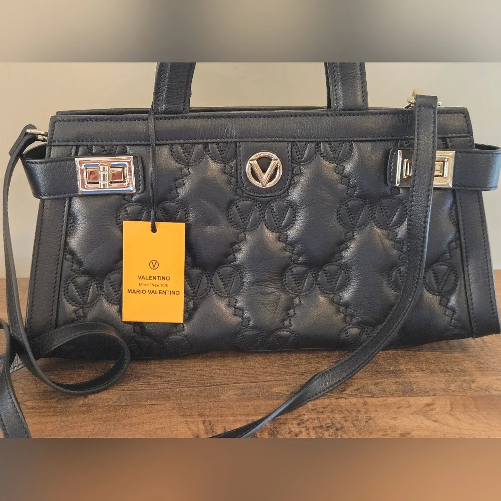 Valentino By Mario Valentino monogram there