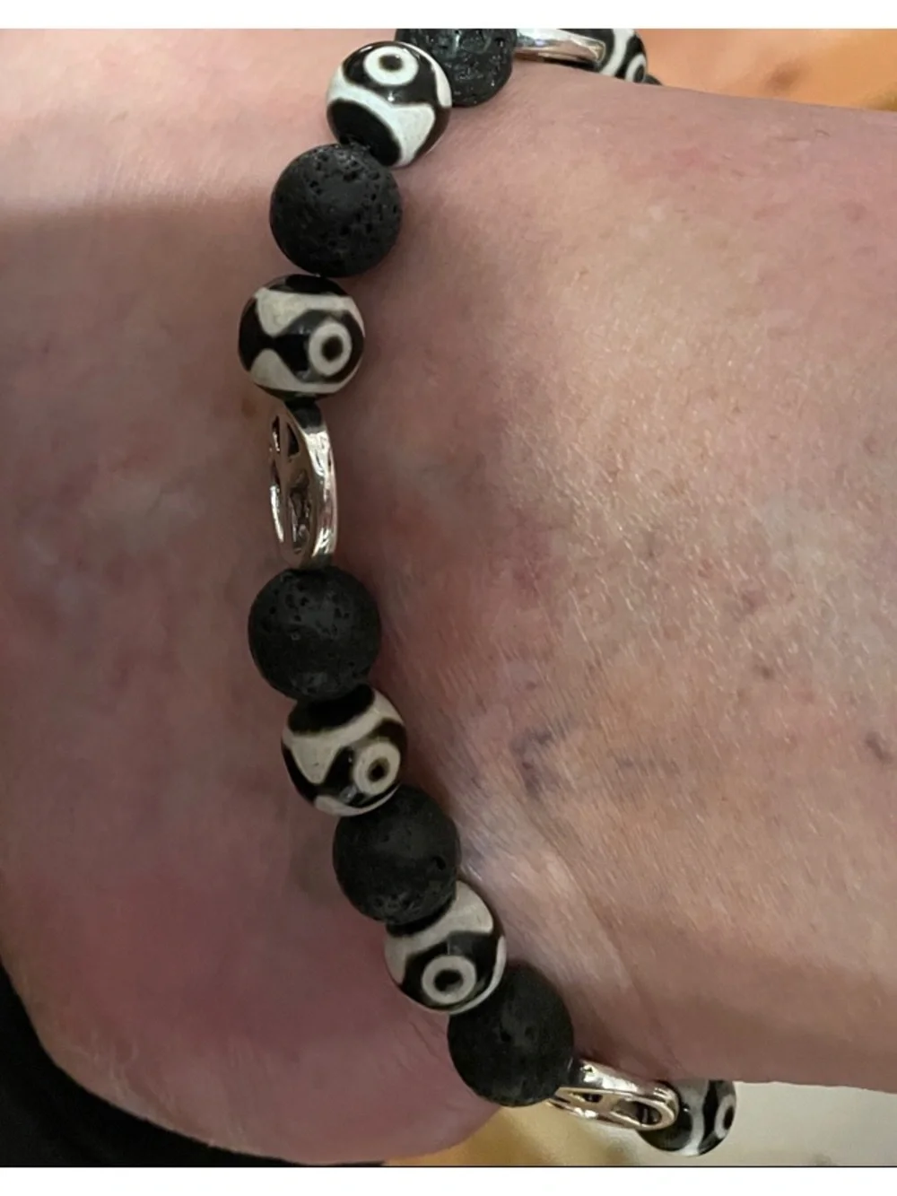 9-Bead Tibetan polish bead Anklet with lava beads and peace signs.