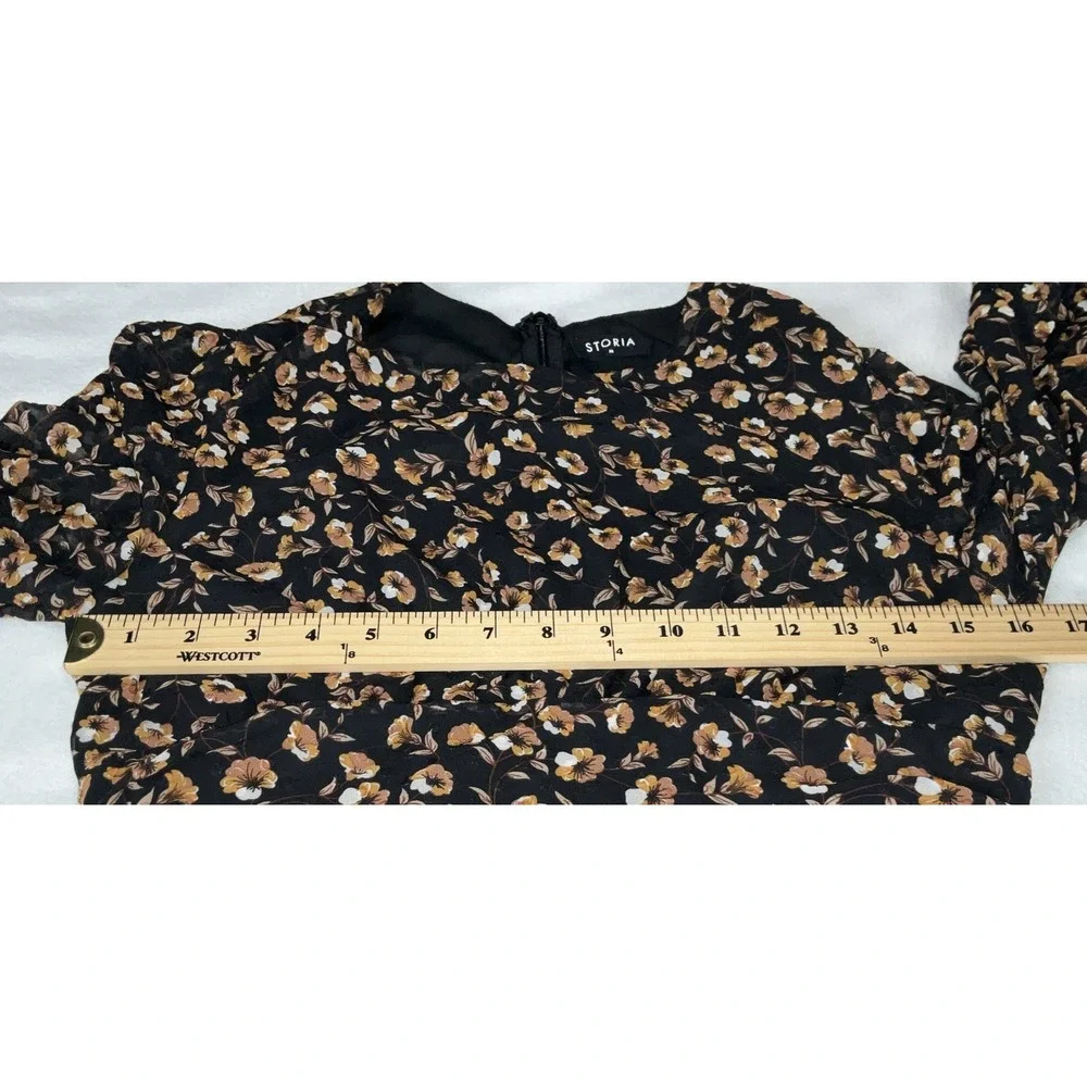 Storia sleeves round dress