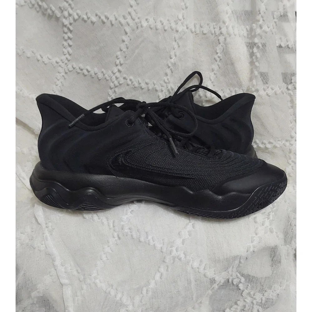 Nike Giannis Immortality 4 basketball shoes in a triple black
