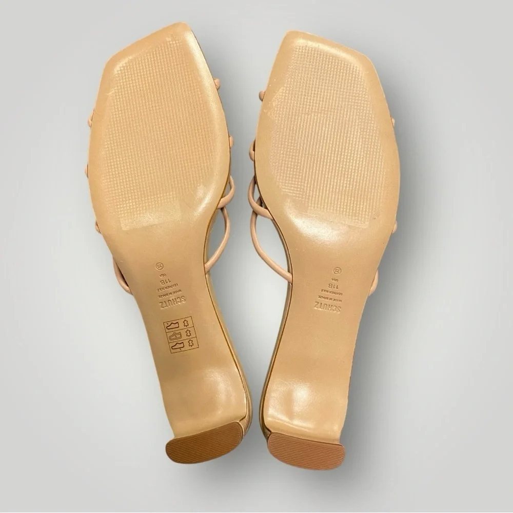SCHUTZ featuring open