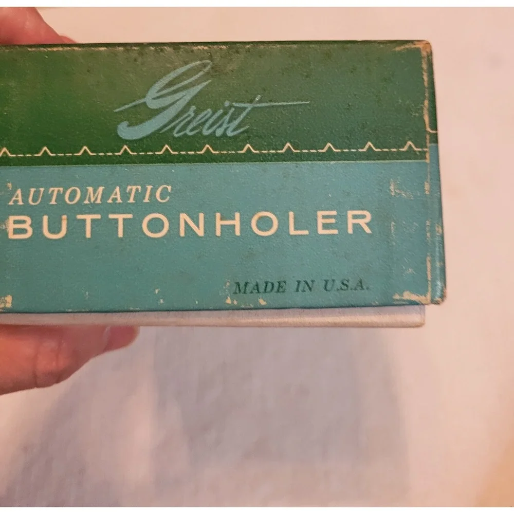 Greist vintage buttonholder