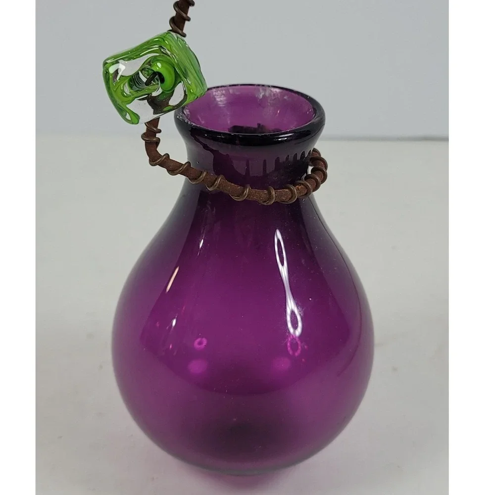 Signed Hand Blown Purple Glass Bud Vase with Metal Wire Hanger and Green Leaf