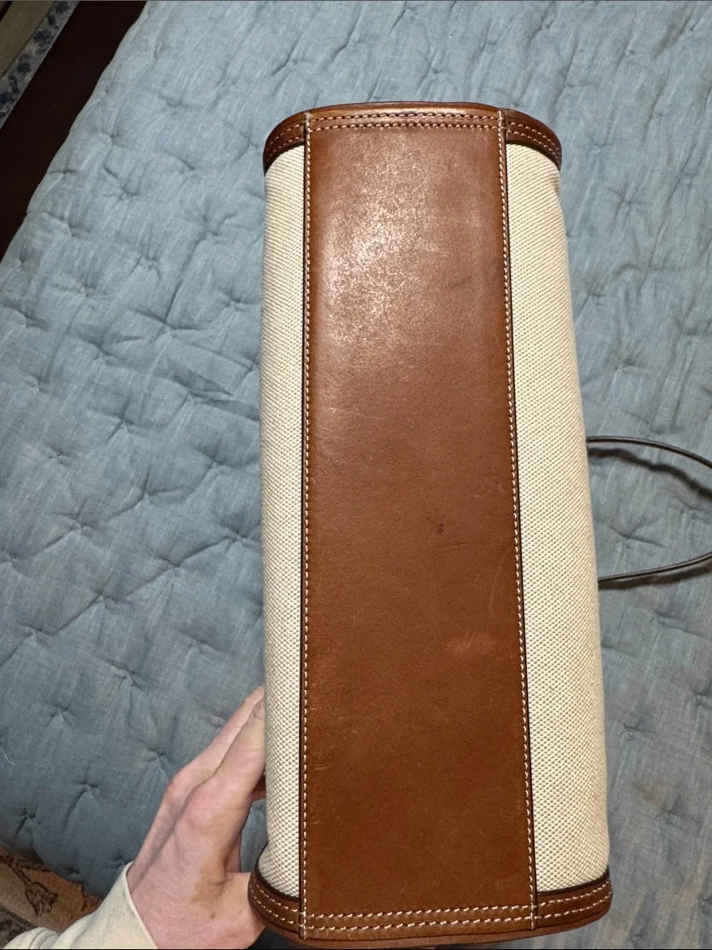 Tory Burch holds 15”