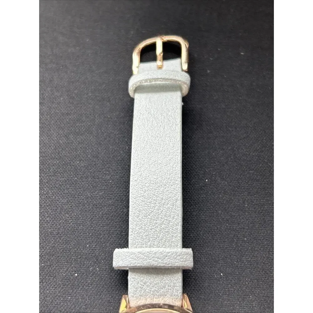 Rose Gold Tone Case Baby Blue Band Women’s Quartz Watch