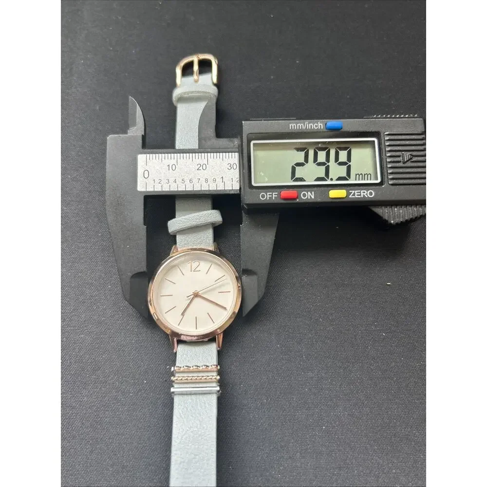 Rose Gold Tone Case Baby Blue Band Women’s Quartz Watch