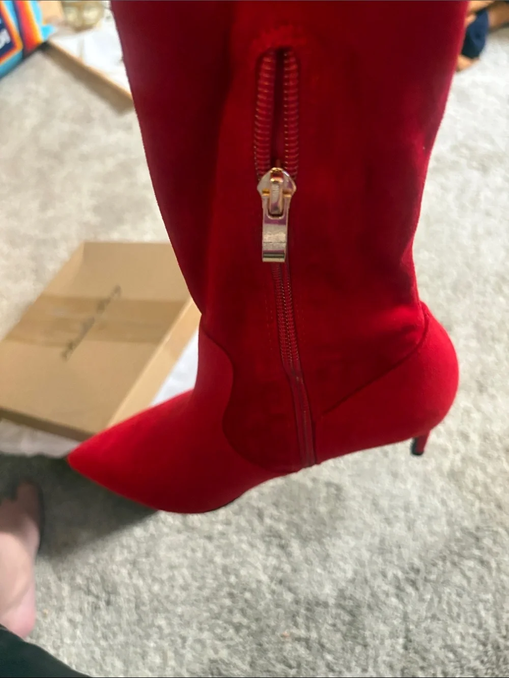 Elizabeth Tang boot knee